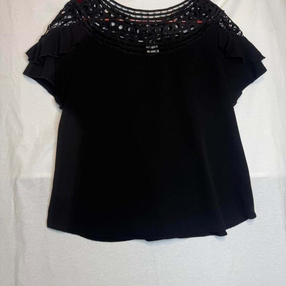 Black blouse with ruffle sleeves
